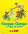 Curious George Rides a Bike