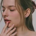 제이로렌 시그니티 큐빅 로즈골드 리본 귀걸이 M03998