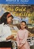 The gold cadilllac