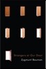 Strangers at Our Door