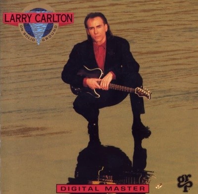 Larry Carlton - On Solid Ground (EU)