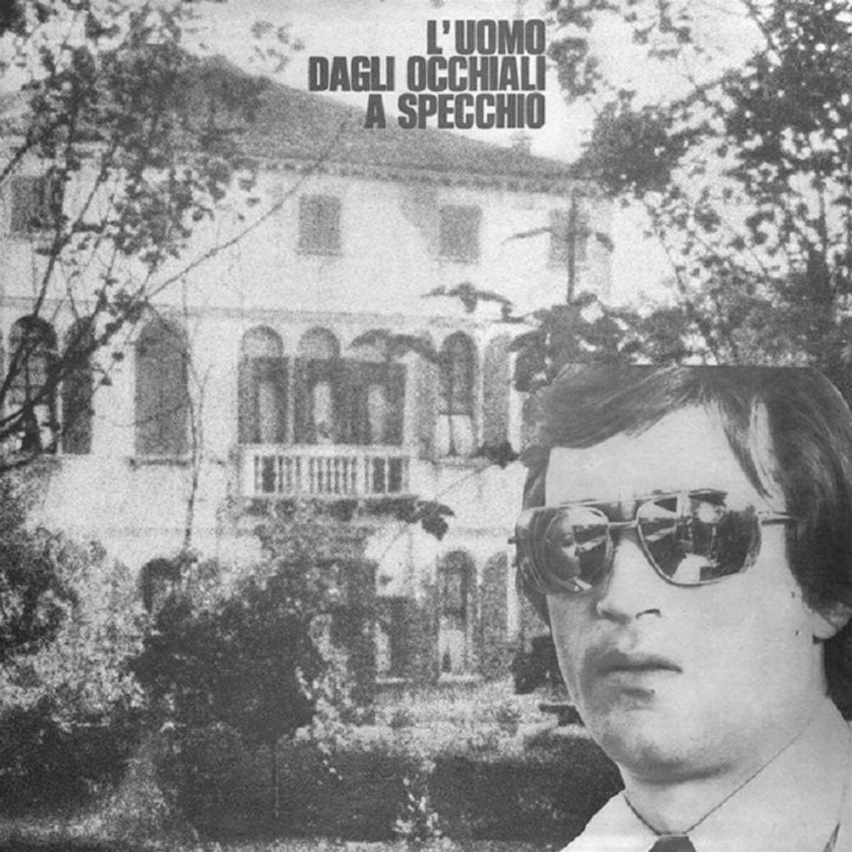 루오모 닥리 오끼알리 아 스페끼오 영화음악 (L'uomo dagli occhiali a specchio OST by Sandro Brugnolini) [투명 컬러 LP]
