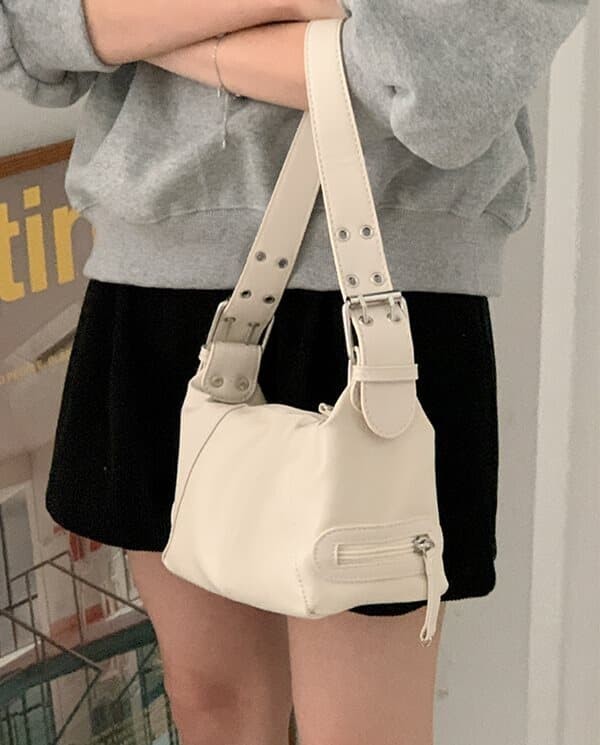 Twin hole shoulder bag