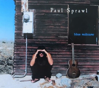 paul sprawl - blue suitcase
