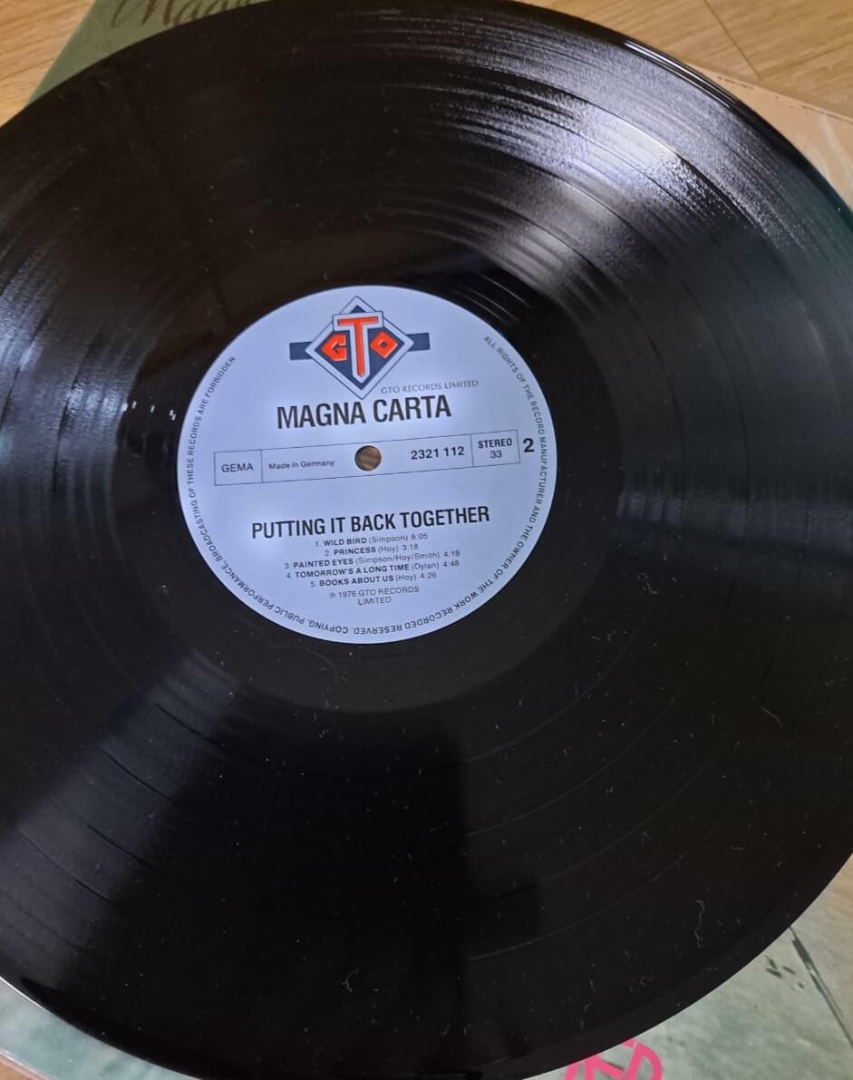 Magna Carta /Putting It Back Together --LP