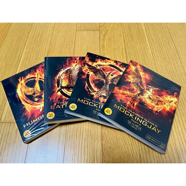 [Blu-ray] 헝거게임 시리즈 1-4 개별 아웃케이스판 (판엠의 불꽃 + 캣칭 파이어 + 모킹제이 + 더 파이널) : 블루레이