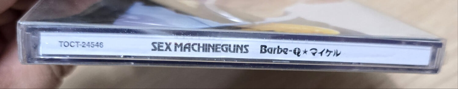 (일본반?/?CD+포토북 / 초회한정 홀로그램 스티커 포함) Sex Machineguns (섹스머신건즈) - Barbe-Qマイケル